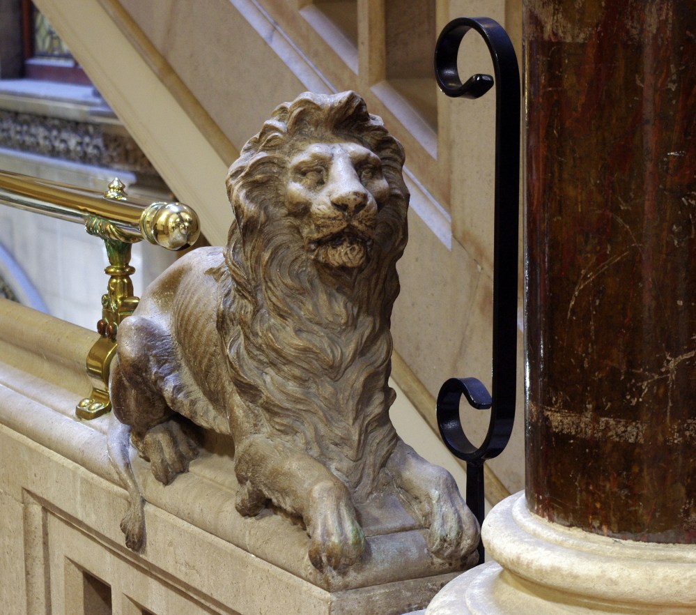 Magnificent lion on the stairs