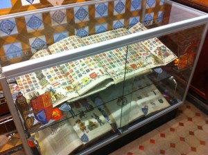The display case which can be found at the Information and Research library, with selected heraldry themed books from our special collections.