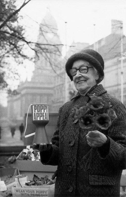 7th November, 1976. Image shows ex-servicewoman and veteran poppy seller for 54 years, 81 year-old Annie Tunnington.