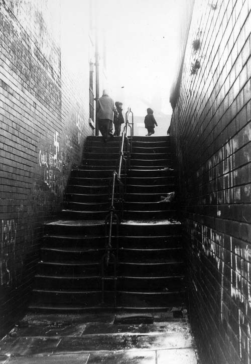 1970. View shows a flight of steps leading up from Servia Hill (formerly New Camp Road) to Grosvenor Hill (formerly Camp Road), all in Woodhouse. From www.leodis.net, (c) Leeds Library and Information Service