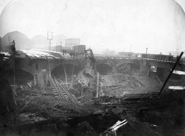 Images shows aftermath of Leeds New Station fire in 1892. Destroyed train tracks are visible.