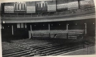 Image shows an empty lecture theatre